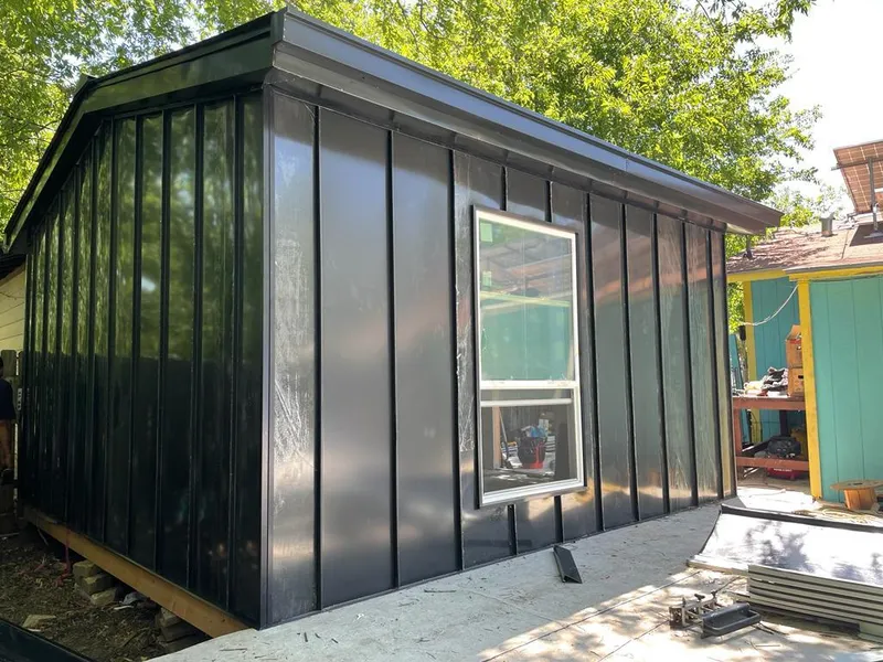 Black standing seam metal wall panels for Metal Roof Installation in Grand Ledge