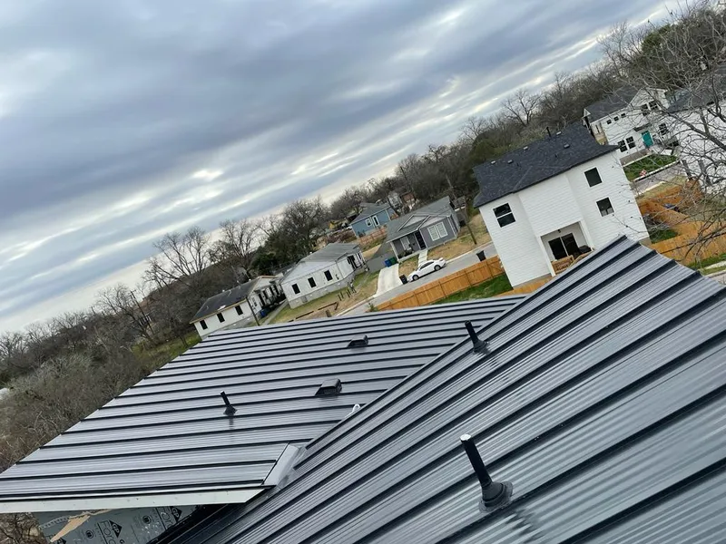 Standing seam metal roof panels with vents for Skylight Repair in Grand Ledge